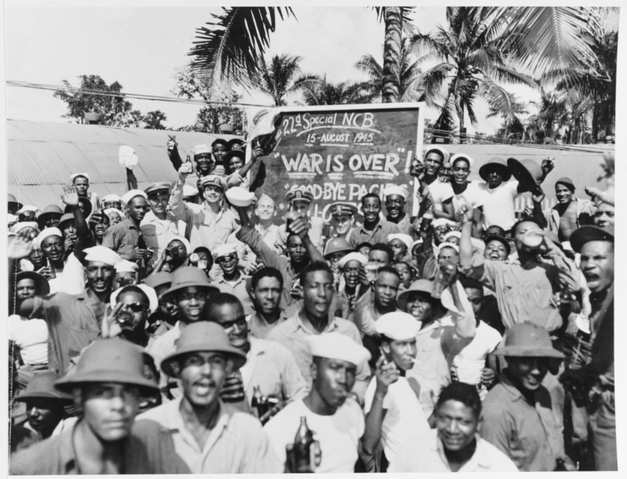 Historical image showing The 22nd Special Naval Construction Battalion celebrates peace. of Black American soldiers during WWII