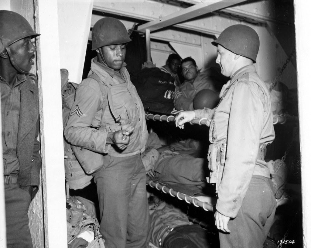 Historical image showing Getting ready to turn in. of Black American soldiers during WWII