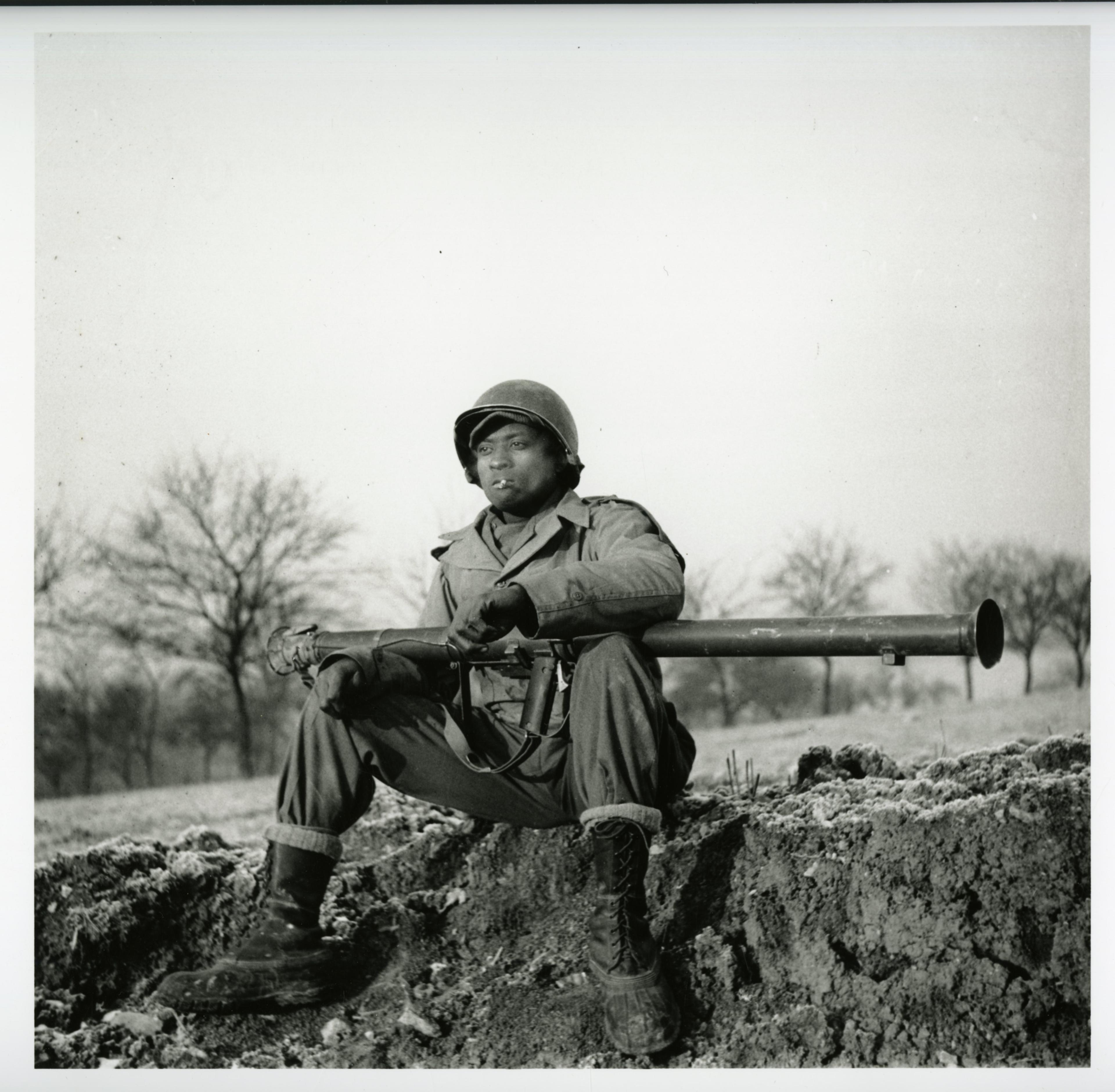 Historical image showing Charlie Rattler of the 614th Tank Destroyer Battalion of Black American soldiers during WWII