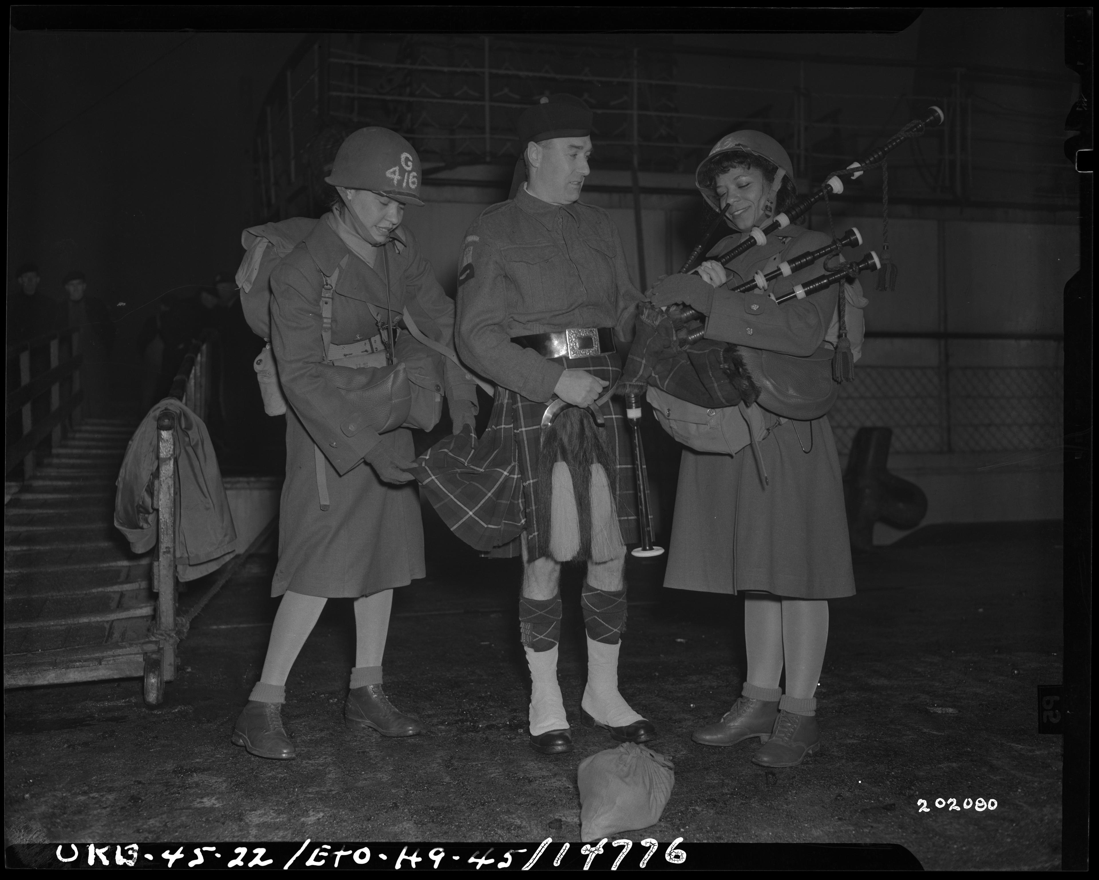 Historical image showing The arrival of the 6888th Central Postal Directory Battalion in Scotland of Black American soldiers during WWII