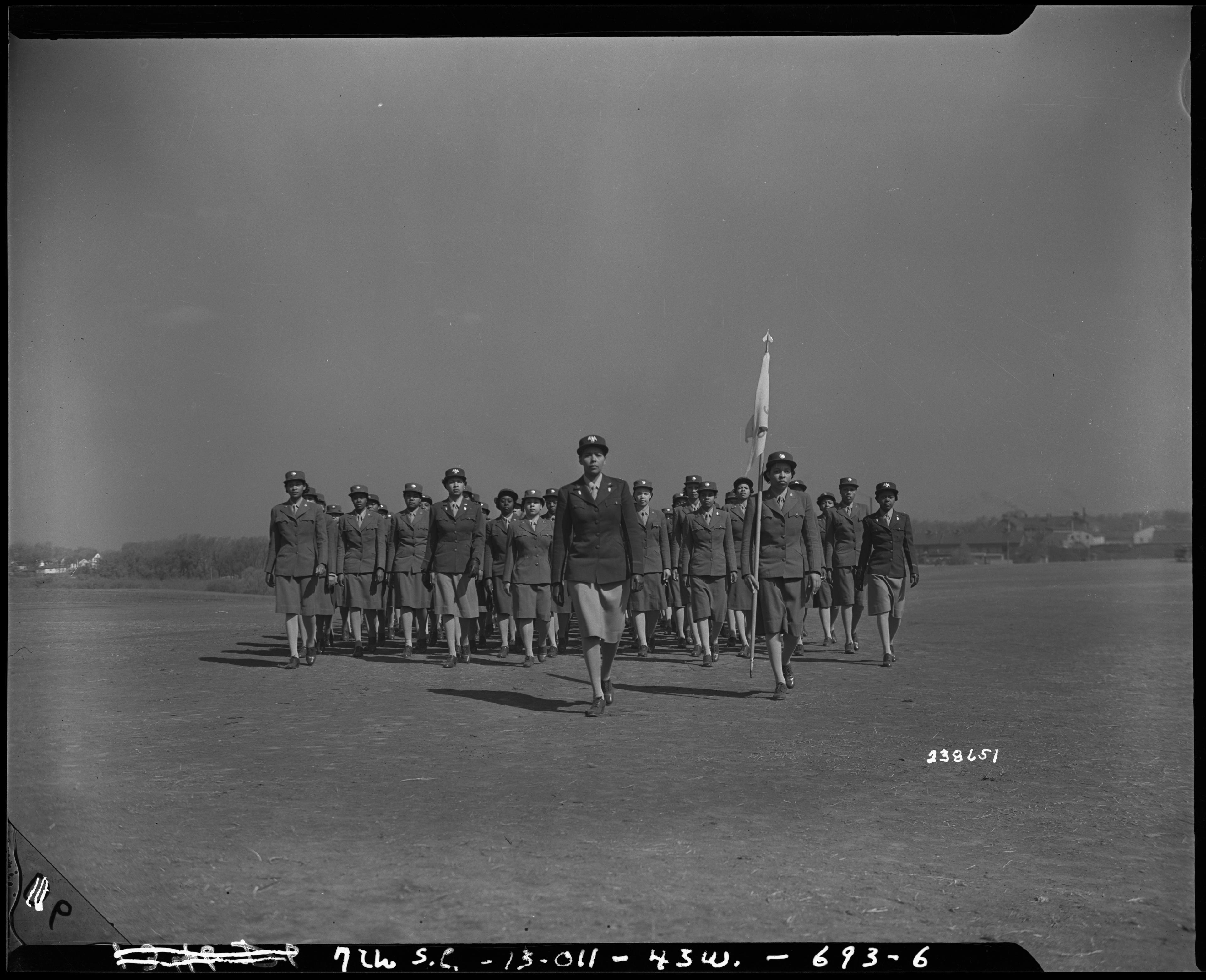 Historical image showing Photograph of the Charity Adams and her company at Fort Des Moines, Iowa of Black American soldiers during WWII