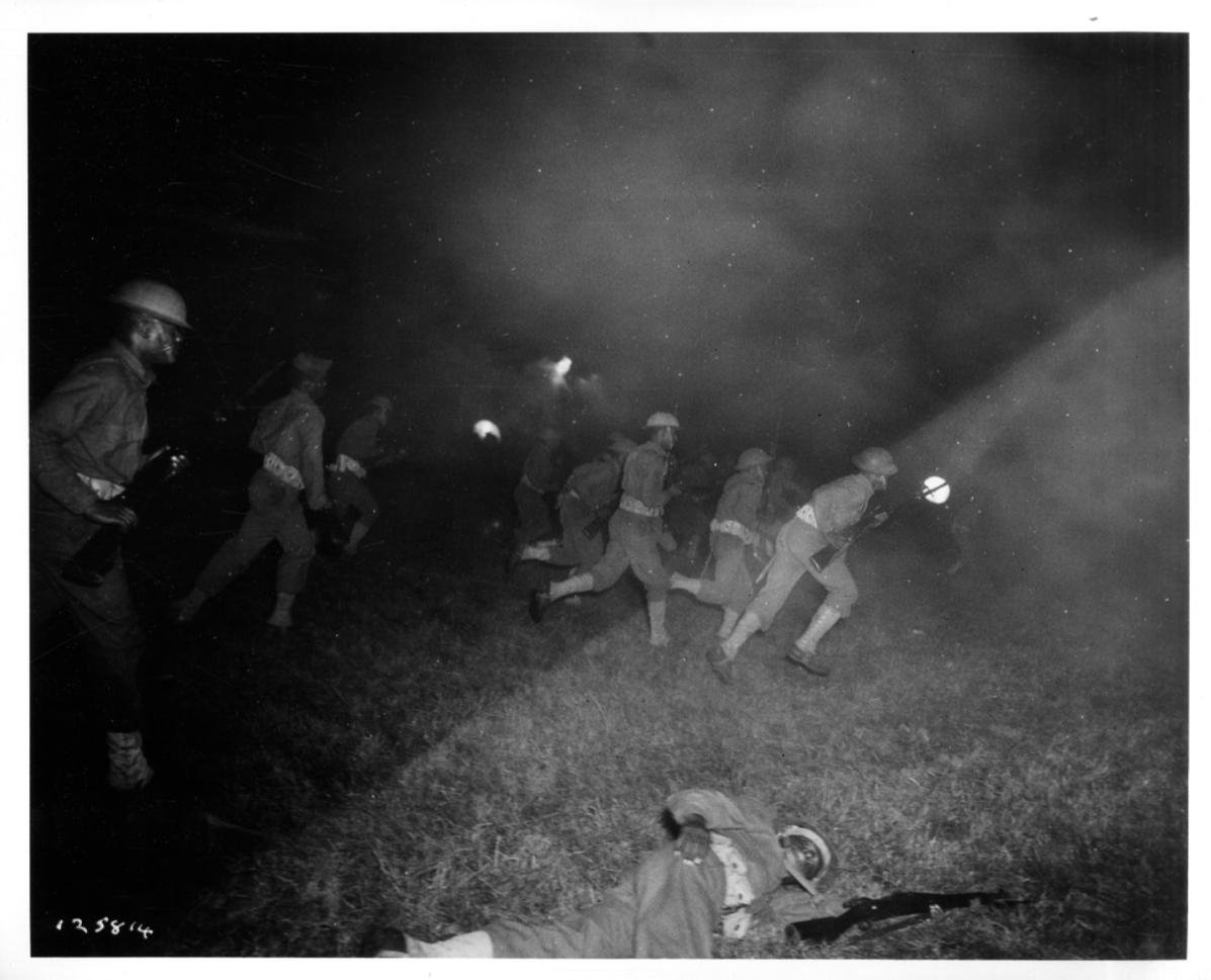 Historical image showing Soldiers of the 76th or 77th Coast Artillery during a training exercise of Black American soldiers during WWII