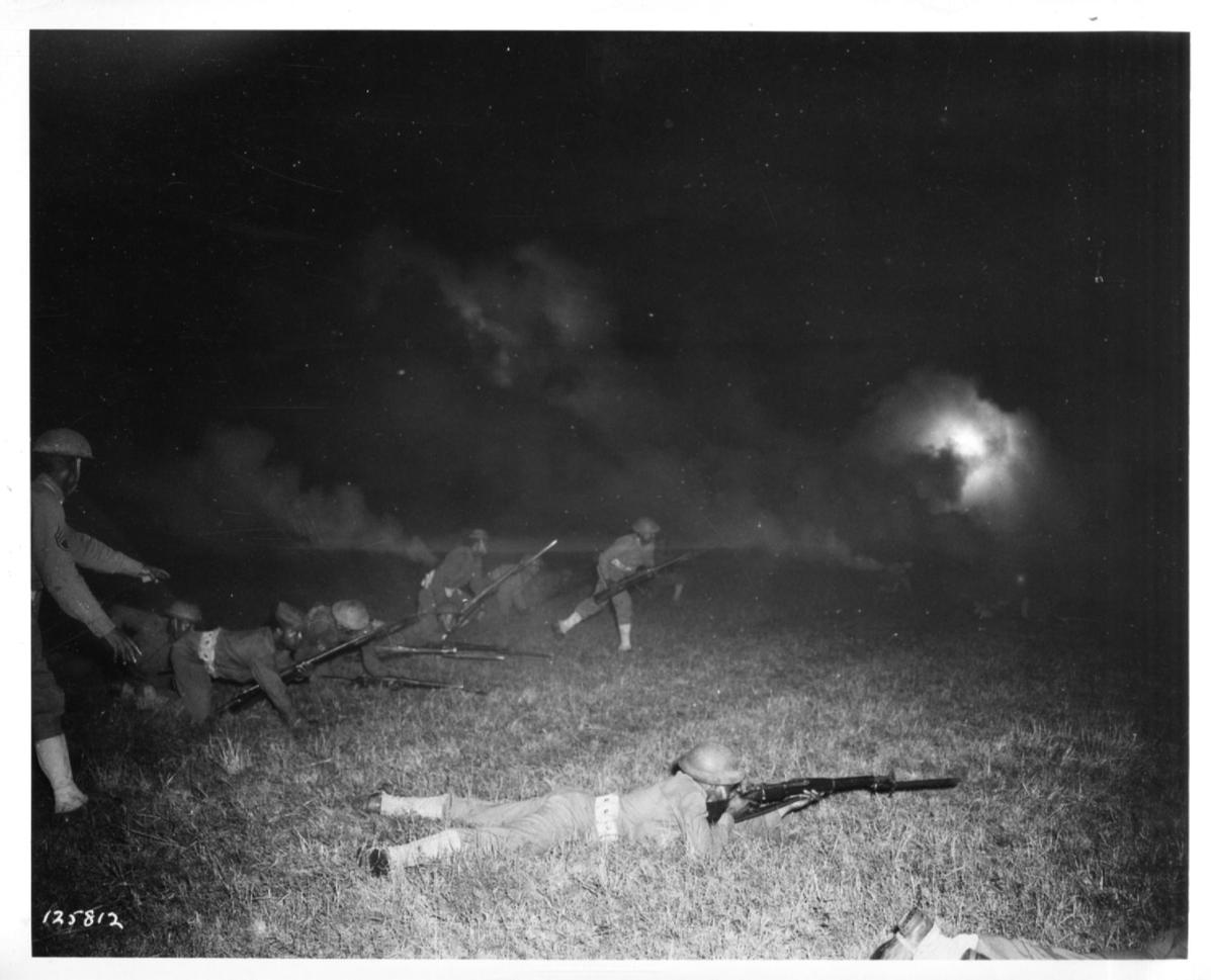 Historical image showing Soldiers of the 76th or 77th Coast Artillery during a training exercise of Black American soldiers during WWII