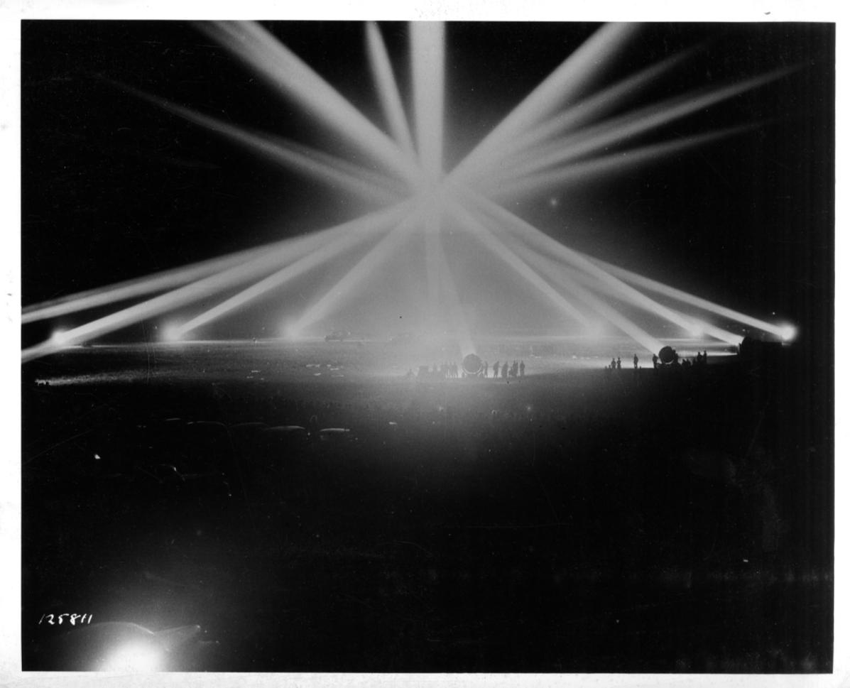 Historical image showing Soldiers of Battery E the 76th Coast Artillery are lighting up the field during exercises of Black American soldiers during WWII