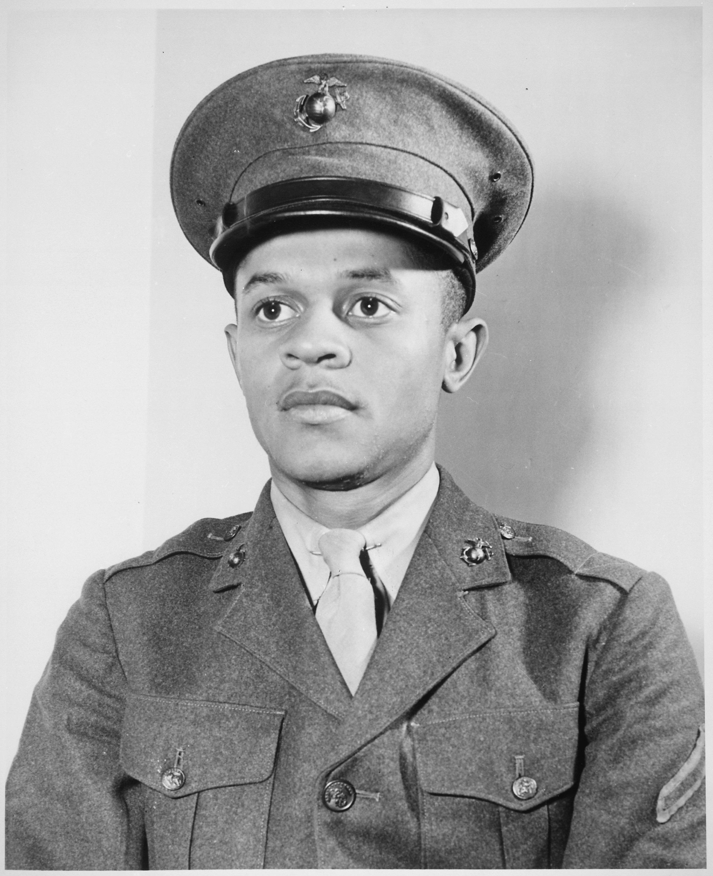 Historical image showing Howard Perry, the first Black American to arrive at Camp Lejeune, NC. of Black American soldiers during WWII