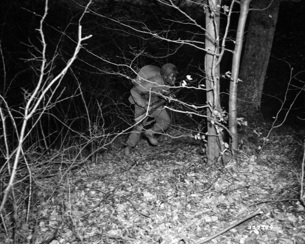 Historical image showing Private George E. Stevens during infantry training. of Black American soldiers during WWII