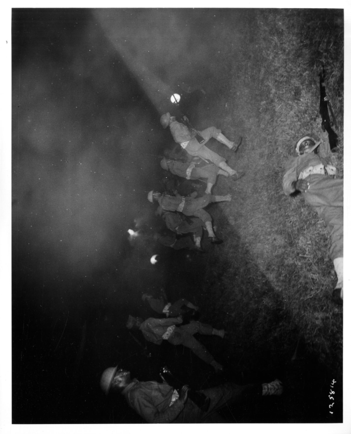 Historical image showing Soldiers of the 76th or 77th Coast Artillery during a training exercise of Black American soldiers during WWII