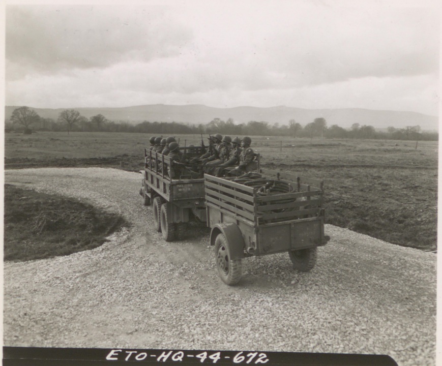 Historical image showing Personnel Truck and Trailer of the 3889 Gas Supply Company of Black American soldiers during WWII